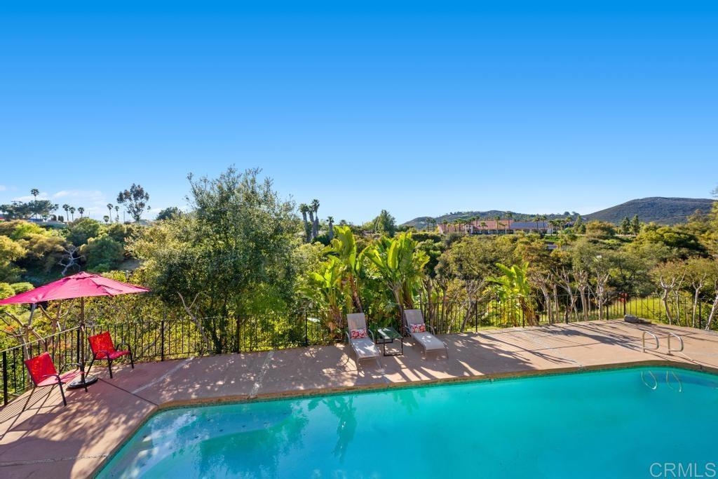 1131 Rainbow Valley Boulevard Fallbrook, CA 92028 - Photo 27 of 73 a view of a yard with an umbrella