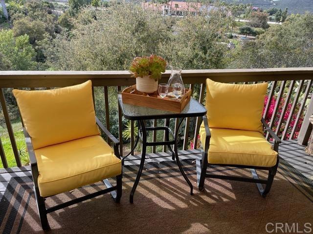 1131 Rainbow Valley Boulevard Fallbrook, CA 92028 - Photo 32 of 73 a view of a chairs and table in patio