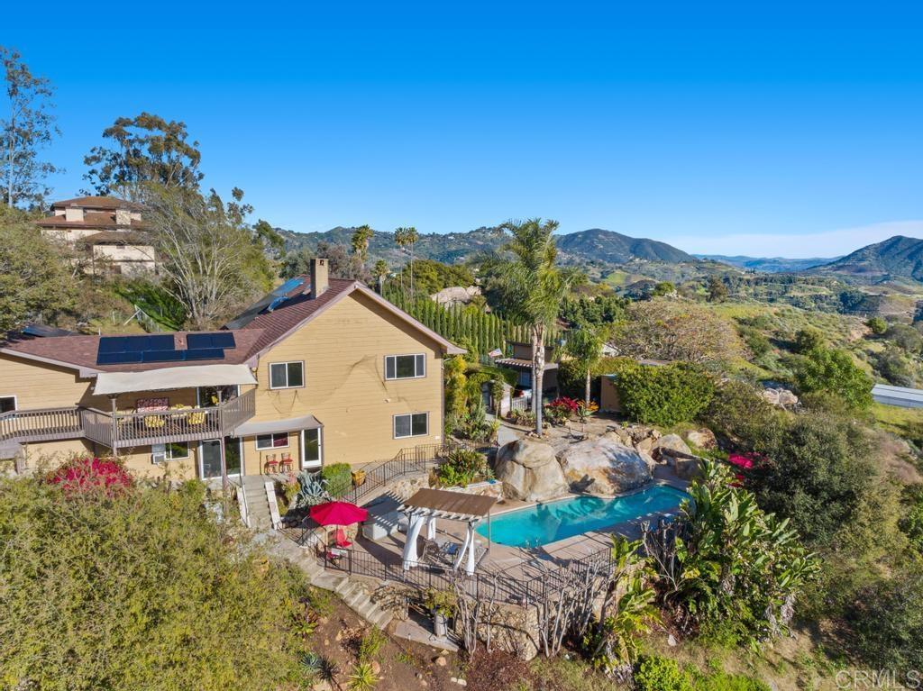 1131 Rainbow Valley Boulevard Fallbrook, CA 92028 - Photo 38 of 73 a view of houses with outdoor space and seating area