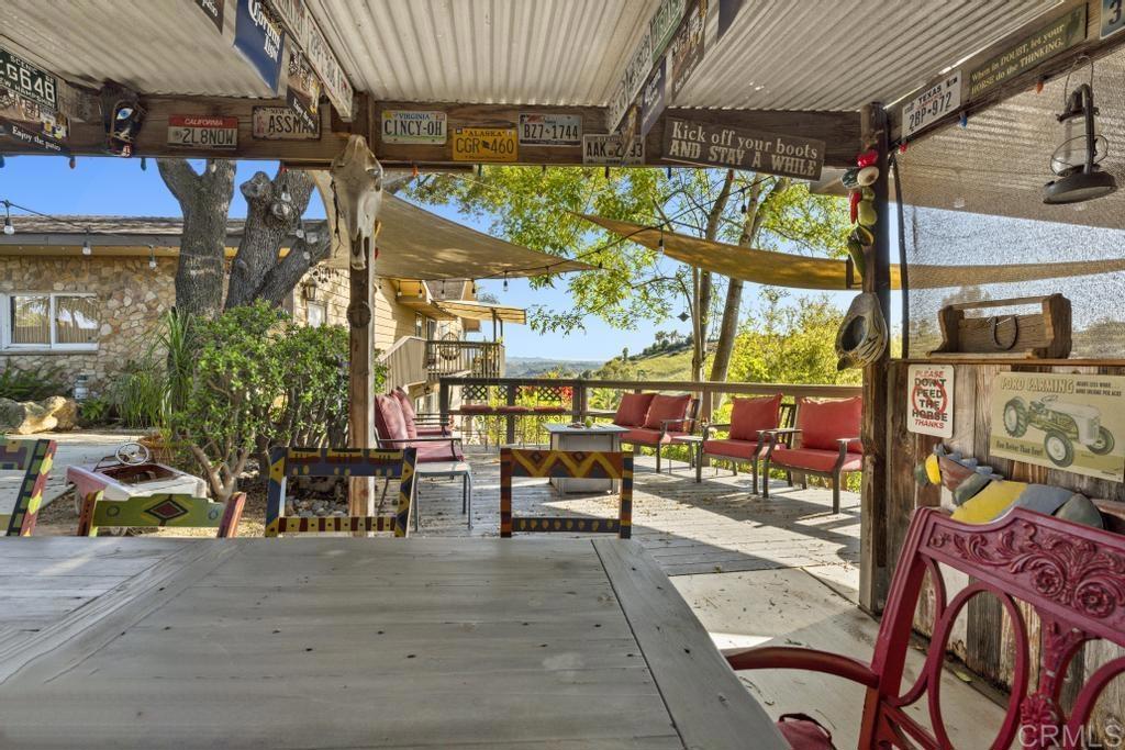 1131 Rainbow Valley Boulevard Fallbrook, CA 92028 - Photo 45 of 73 an outdoor space with lots of furniture and plants