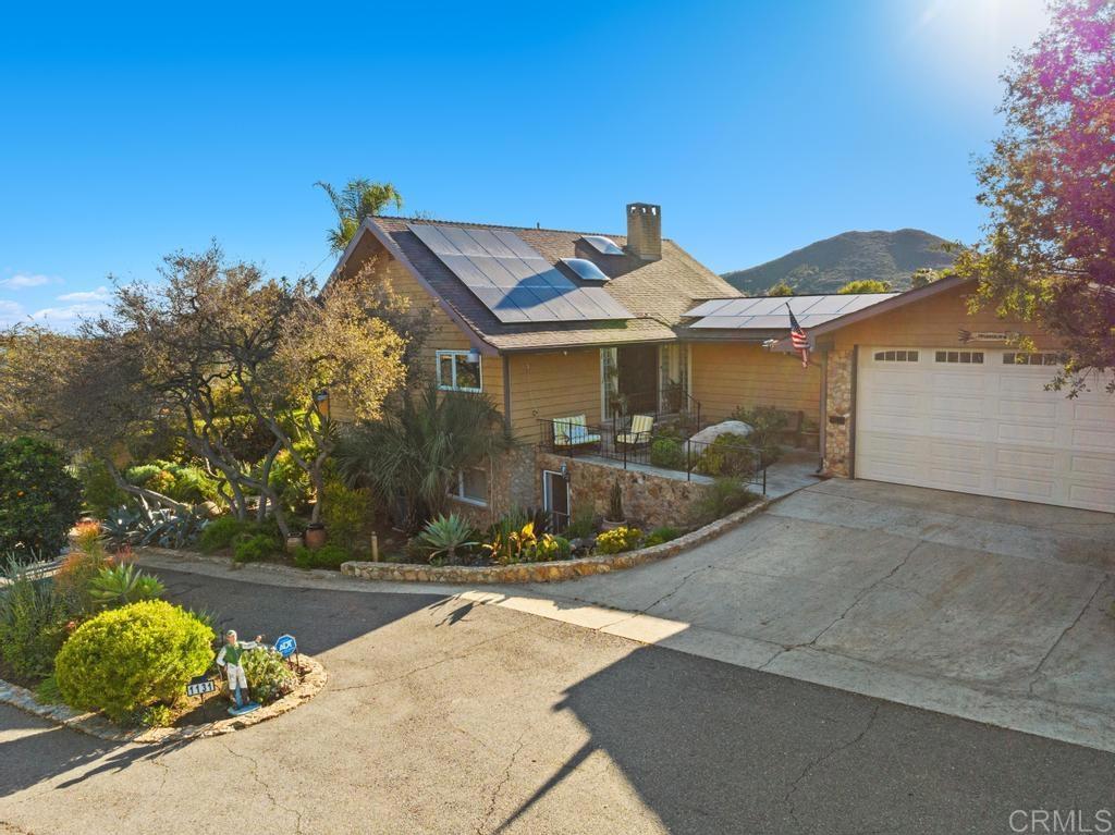 1131 Rainbow Valley Boulevard Fallbrook, CA 92028 - Photo 63 of 73 a front view of a house with yard
