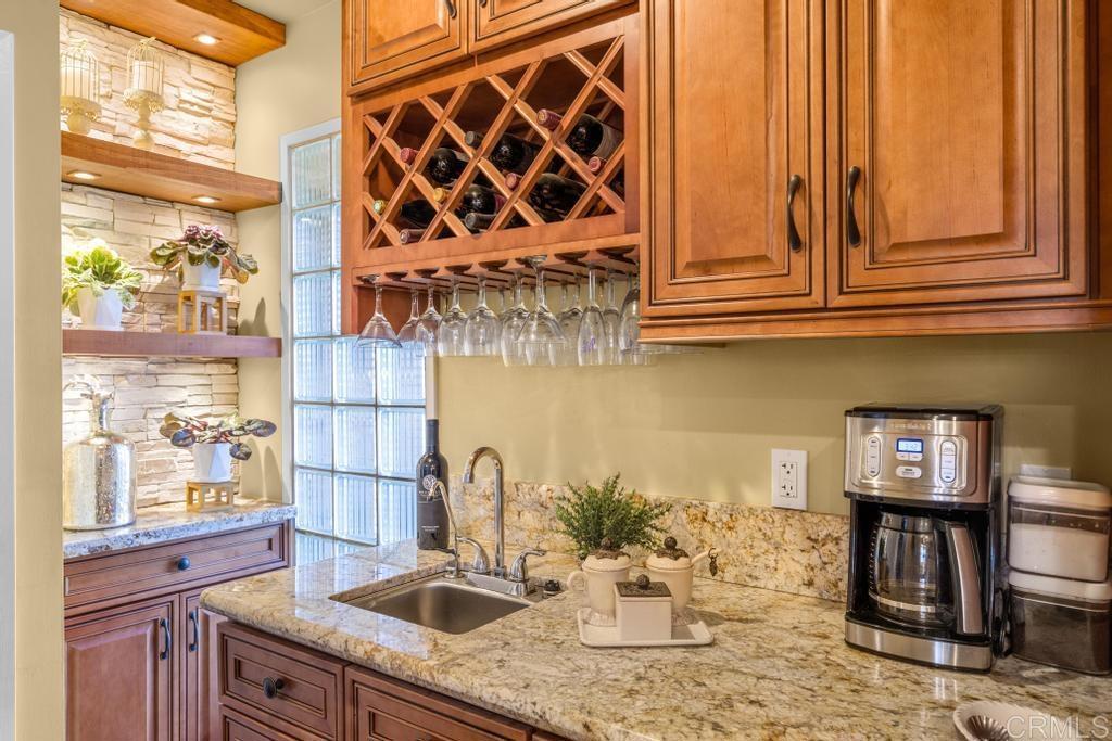 1131 Rainbow Valley Boulevard Fallbrook, CA 92028 - Photo 8 of 73 a kitchen with a sink and cabinets