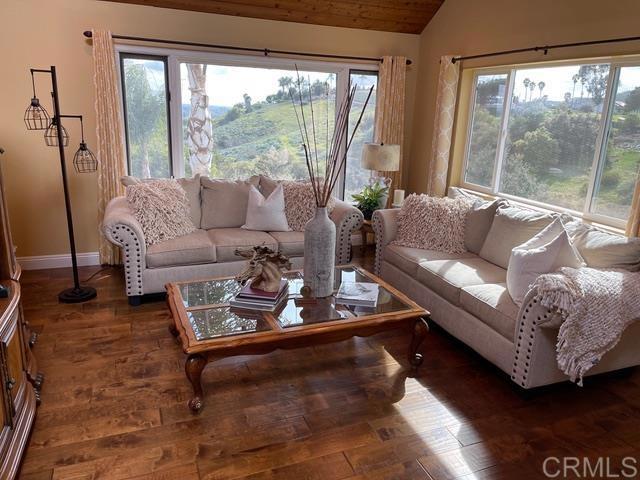 1131 Rainbow Valley Boulevard Fallbrook, CA 92028 - Photo 10 of 73 a living room with furniture and a large window