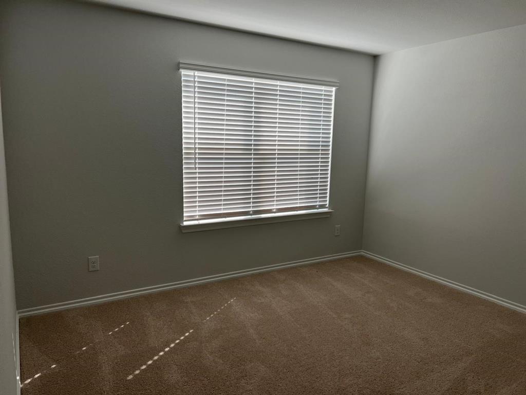 1809 Osage Trail Mesquite, TX 75149 - Photo 12 of 18 an empty room with a window