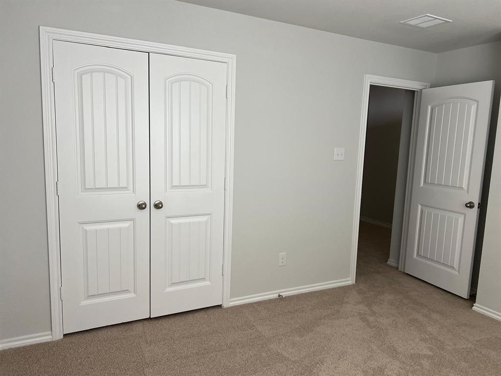 1809 Osage Trail Mesquite, TX 75149 - Photo 13 of 18 an empty room with a door