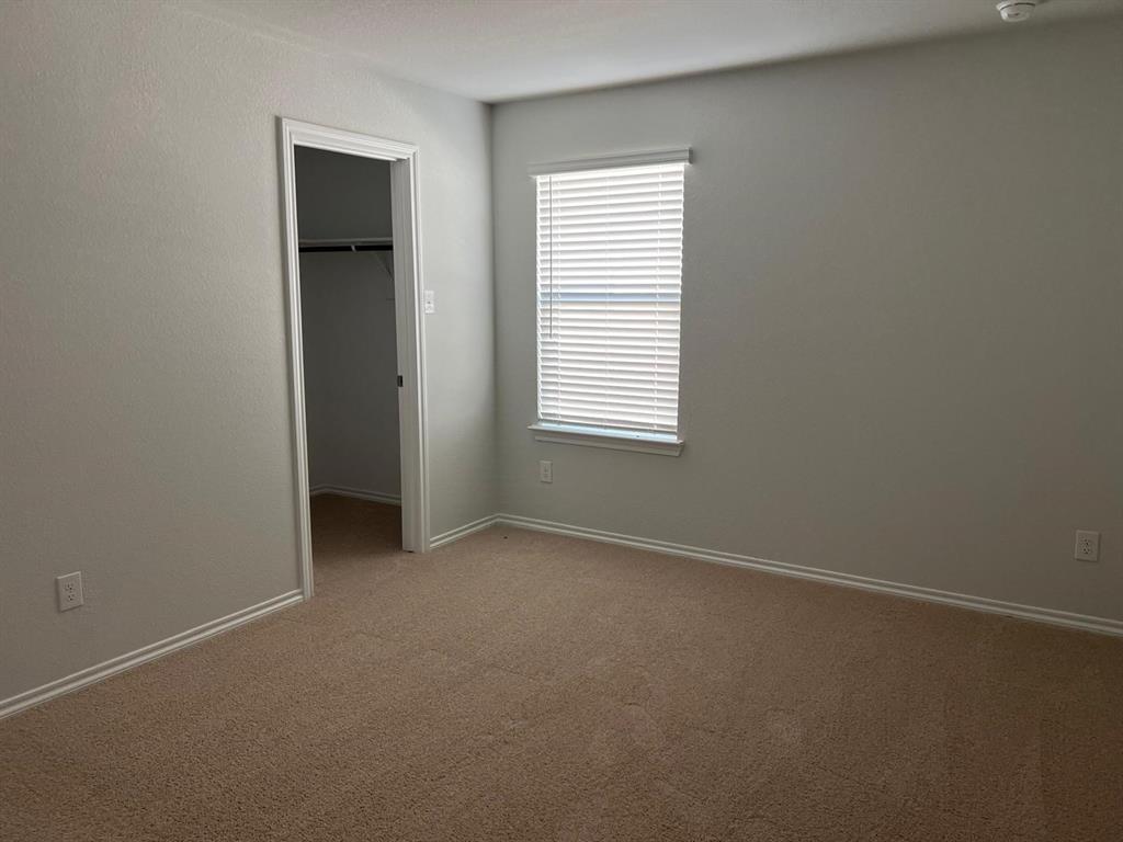 1809 Osage Trail Mesquite, TX 75149 - Photo 14 of 18 an empty room with a window