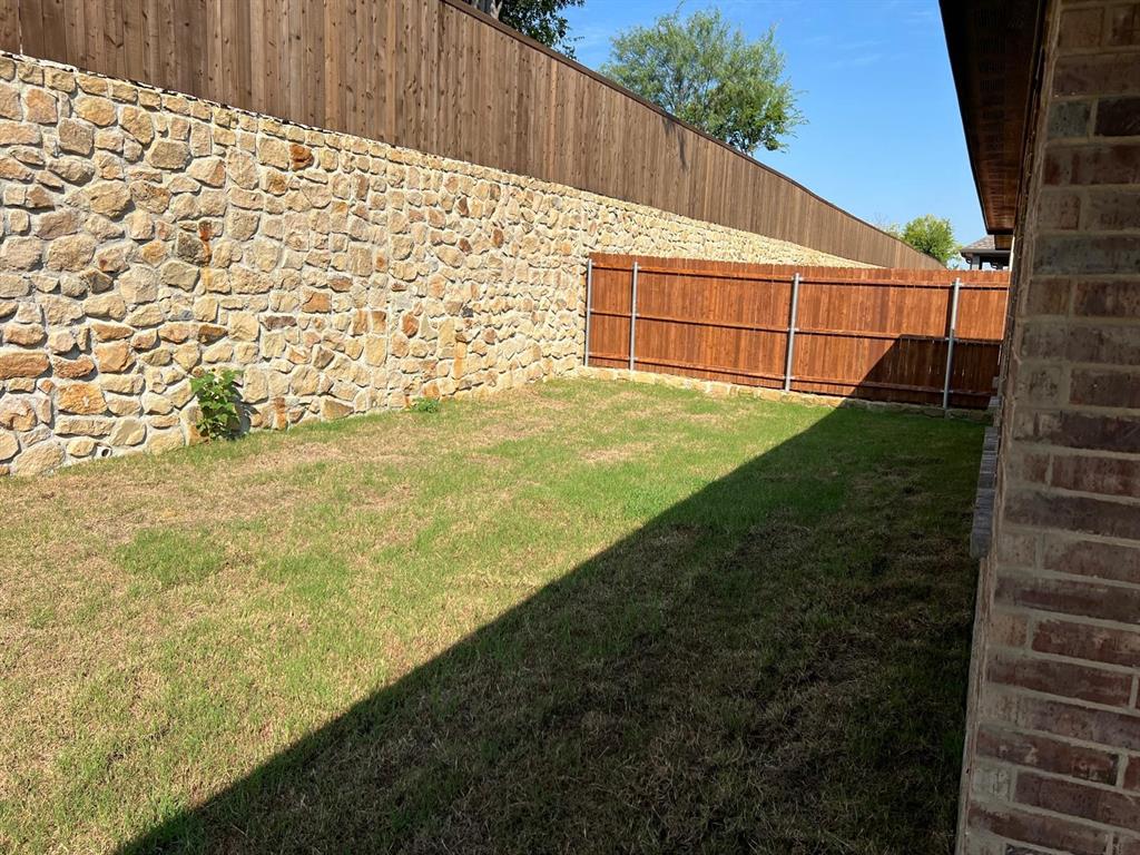 1809 Osage Trail Mesquite, TX 75149 - Photo 16 of 18 a view of a backyard