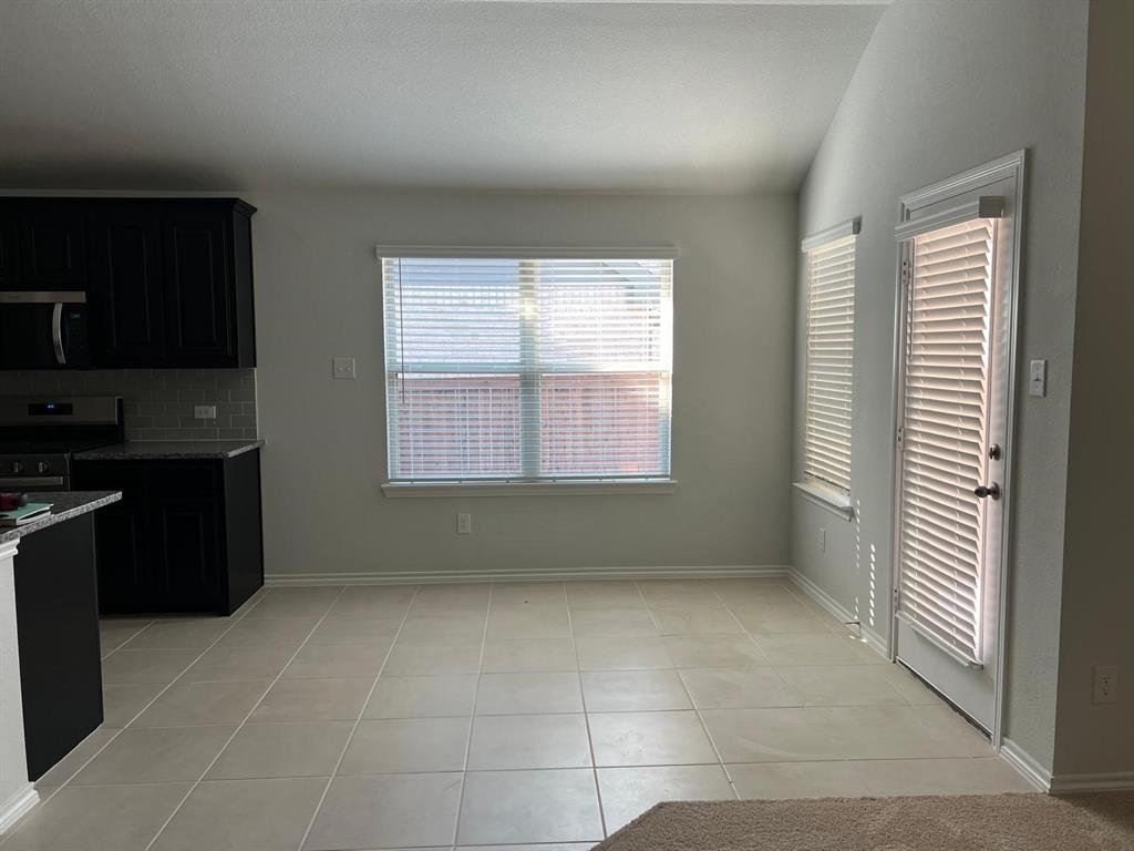 1809 Osage Trail Mesquite, TX 75149 - Photo 6 of 18 a view of an empty room with a window