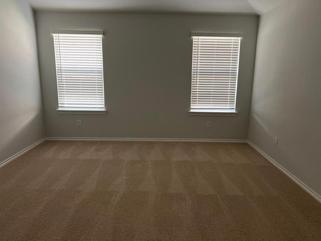 1809 Osage Trail Mesquite, TX 75149 - Photo 8 of 18 an empty room with a window