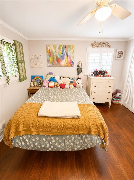225 Pineridge Road Bogart, GA 30622 - Photo 33 of 53 a bedroom with a bed and wooden floor