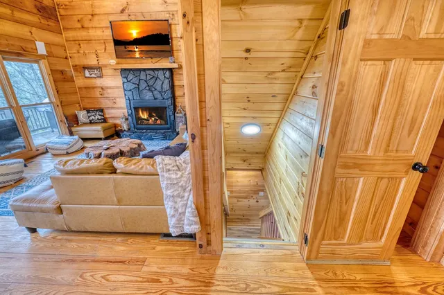 a bathroom with a shower and a window