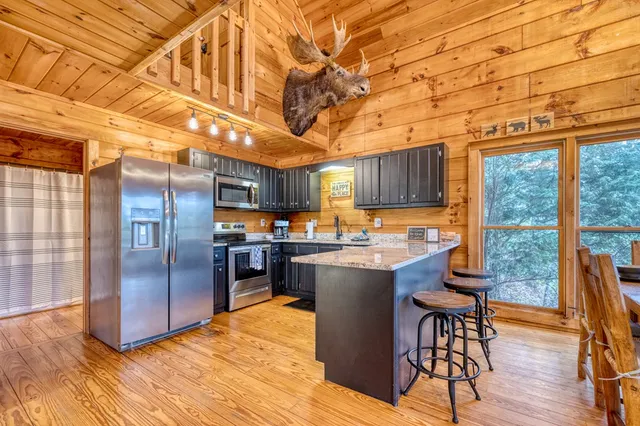 a view of a living room with furniture