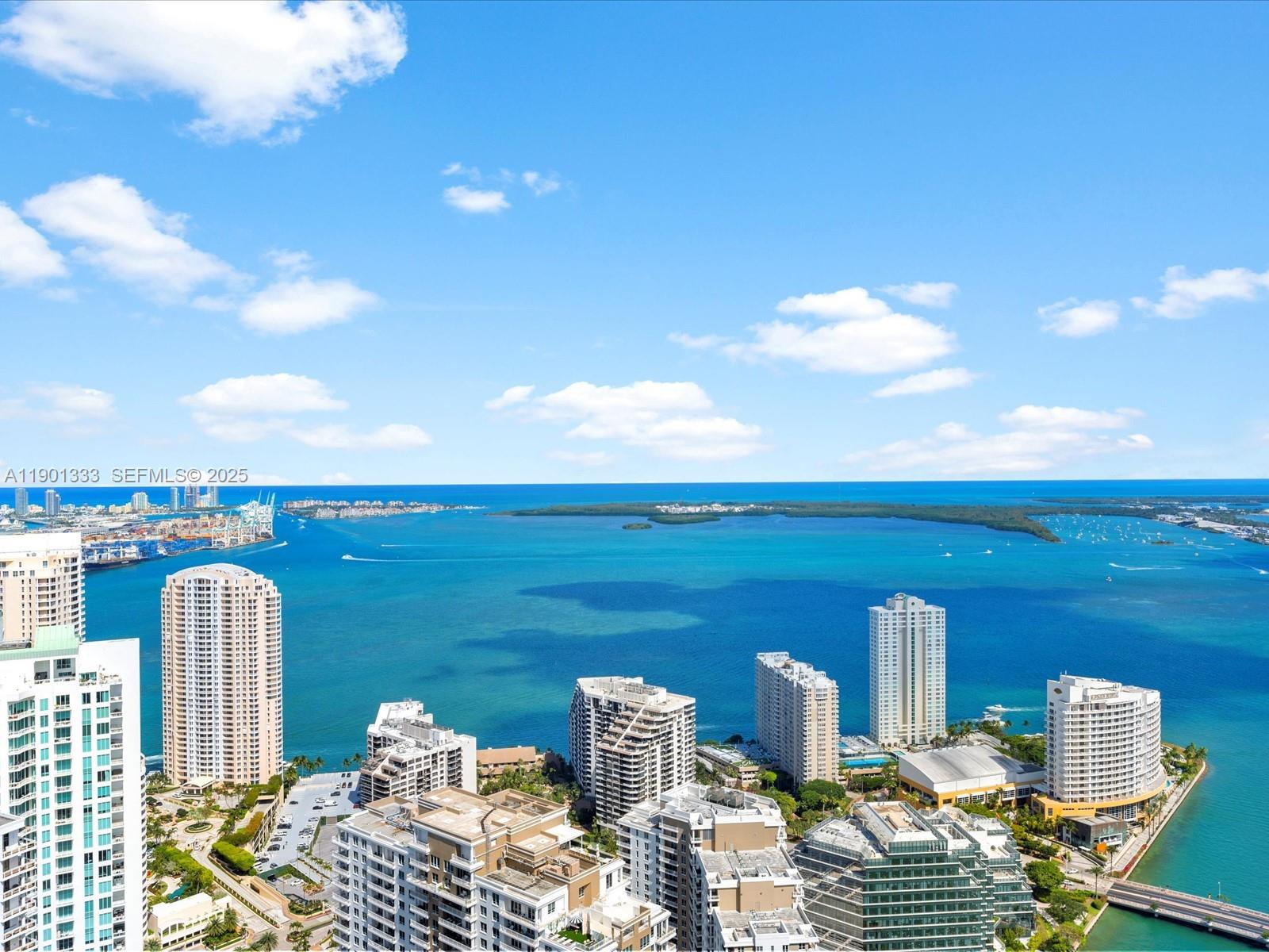 475 Brickell Avenue, Unit 5507 Miami, FL 33131 - Photo 14 of 21 a view of balcony with two chairs and a table