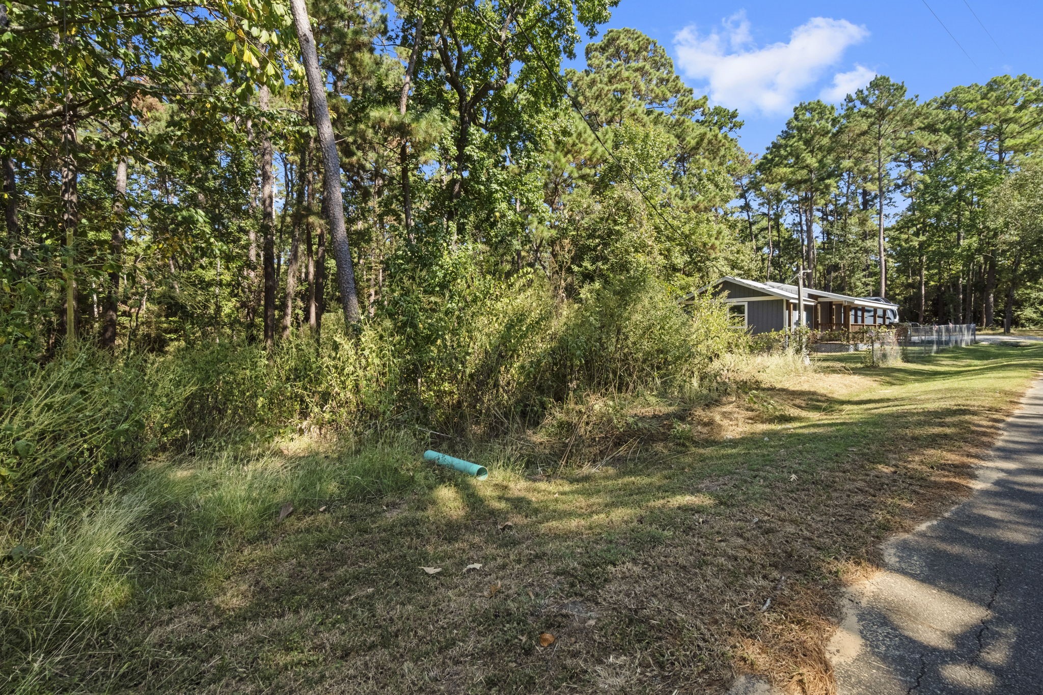 384 Phillips Road Onalaska, TX 77360 - Photo 28 of 28 The lots to the LEFT of the subject property to the light pole are included with the subject property