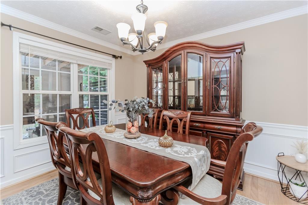 2790 Alcovy River View Dacula, GA 30019 - Photo 7 of 23 a view of a dining room with furniture window and outside view