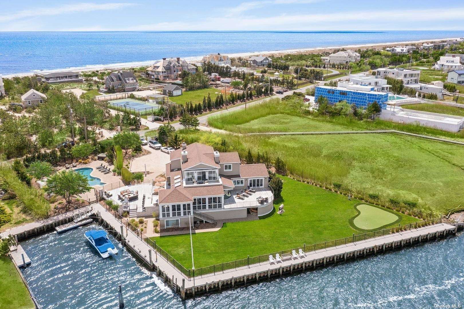 25 Dune Road Quogue, NY 11959 - Photo 1 of 1 a view of a city