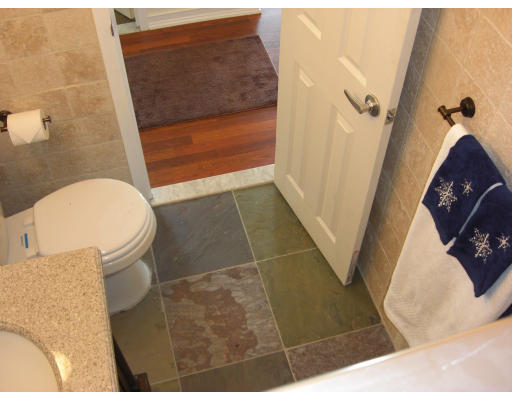 65 East India Row, Unit 16E Boston, MA 02110 - Photo 5 of 11 a bathroom with a sink and toilet