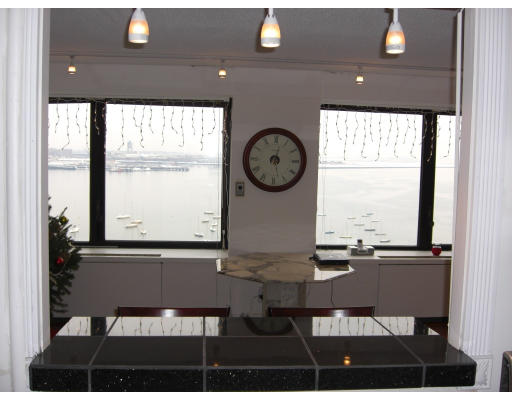 65 East India Row, Unit 16E Boston, MA 02110 - Photo 10 of 11 a view of a floor to ceiling window and wooden floor