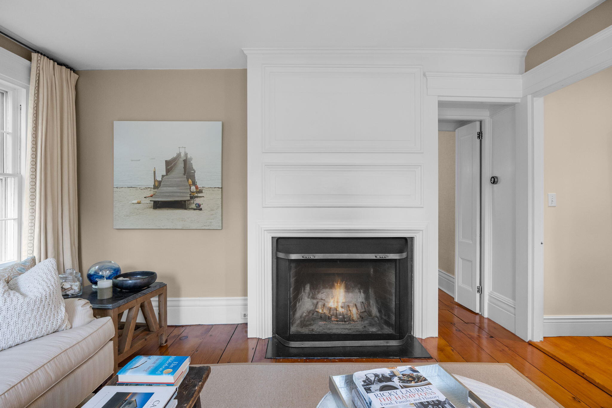 85 Cedar Street Chatham, MA 02633 - Photo 16 of 89 a living room with furniture and a fireplace