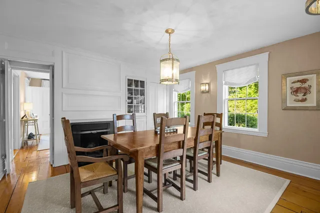 a bathroom with a sink a mirror and a shower