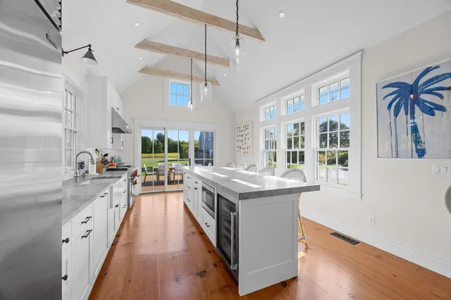a balcony with furniture and garden view
