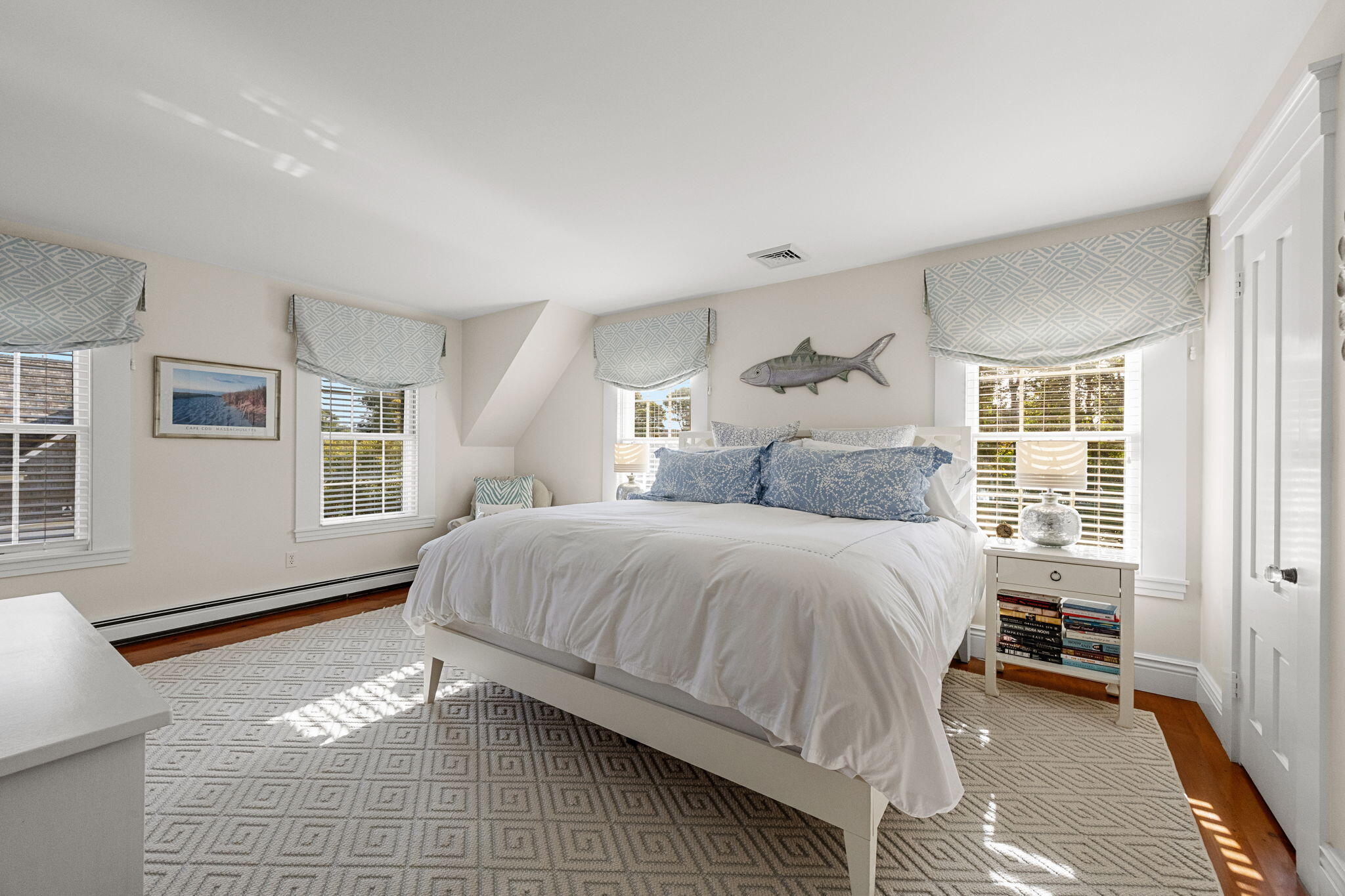 85 Cedar Street Chatham, MA 02633 - Photo 31 of 89 a bedroom with a large bed and a window