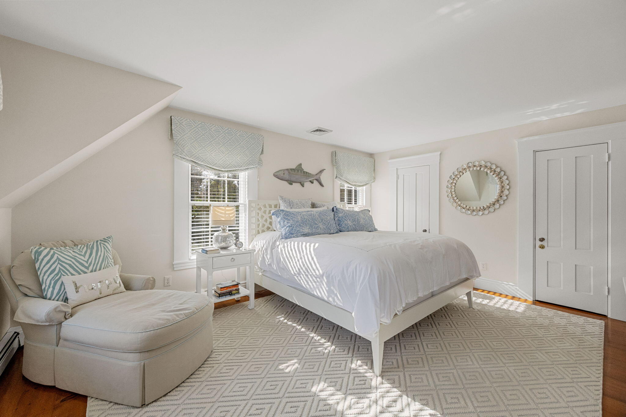 85 Cedar Street Chatham, MA 02633 - Photo 32 of 89 a bedroom with a bed couch and window