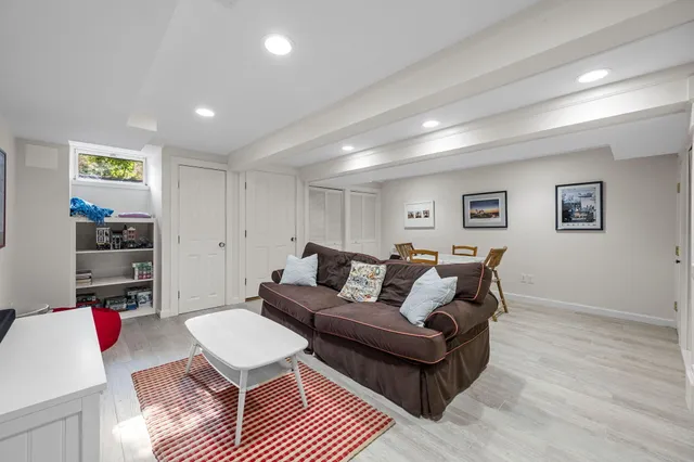 an aerial view of a house with garden space and street view