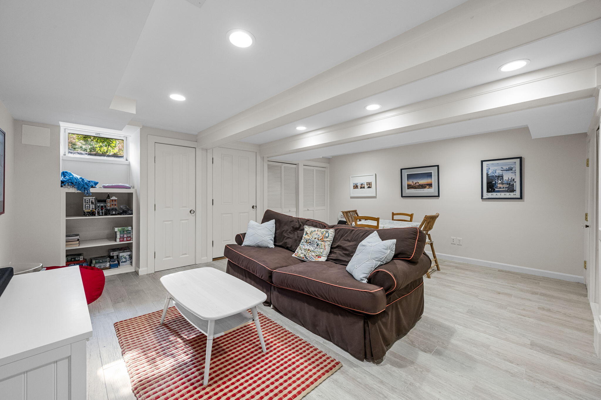 85 Cedar Street Chatham, MA 02633 - Photo 41 of 89 a living room with furniture and a wooden floor
