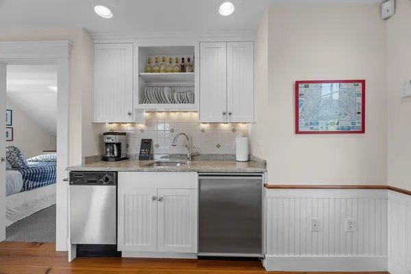 an aerial view of a house with a garden