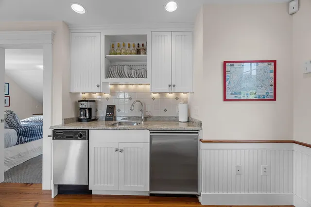 an aerial view of a house with a garden