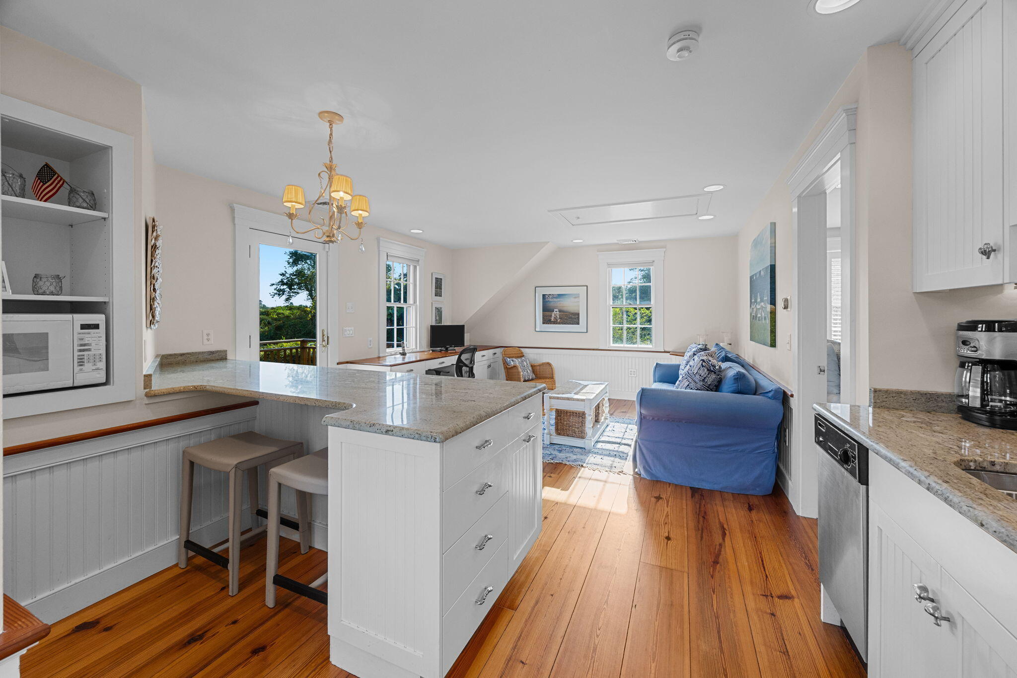 85 Cedar Street Chatham, MA 02633 - Photo 48 of 89 a kitchen with sink stove and wooden floor