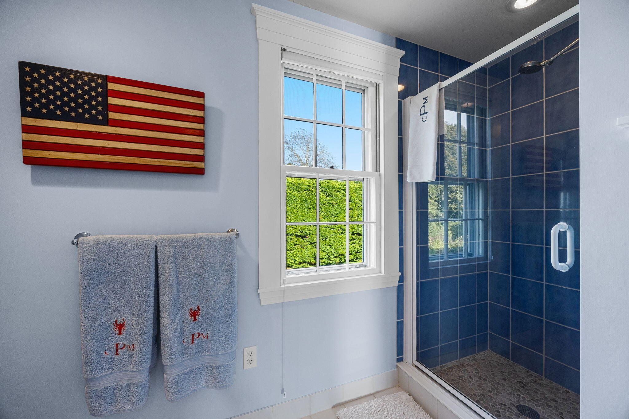 85 Cedar Street Chatham, MA 02633 - Photo 56 of 89 a bathroom with a window and a shower