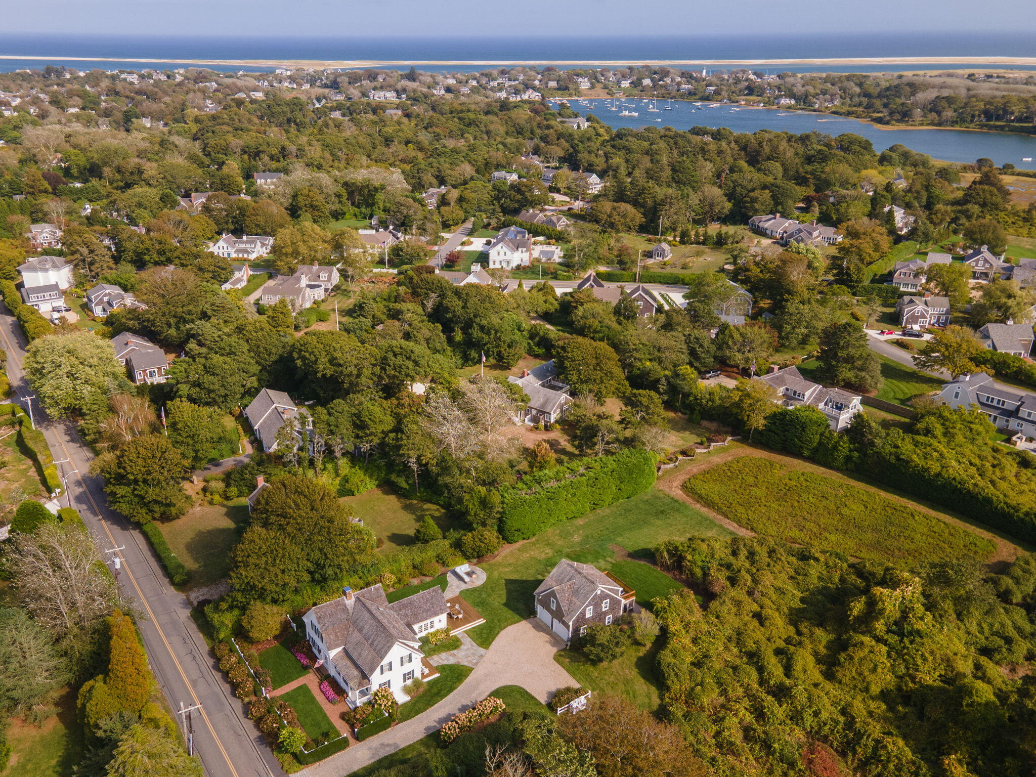 85 Cedar Street Chatham, MA 02633 - Photo 77 of 89 an aerial view of residential houses with outdoor space