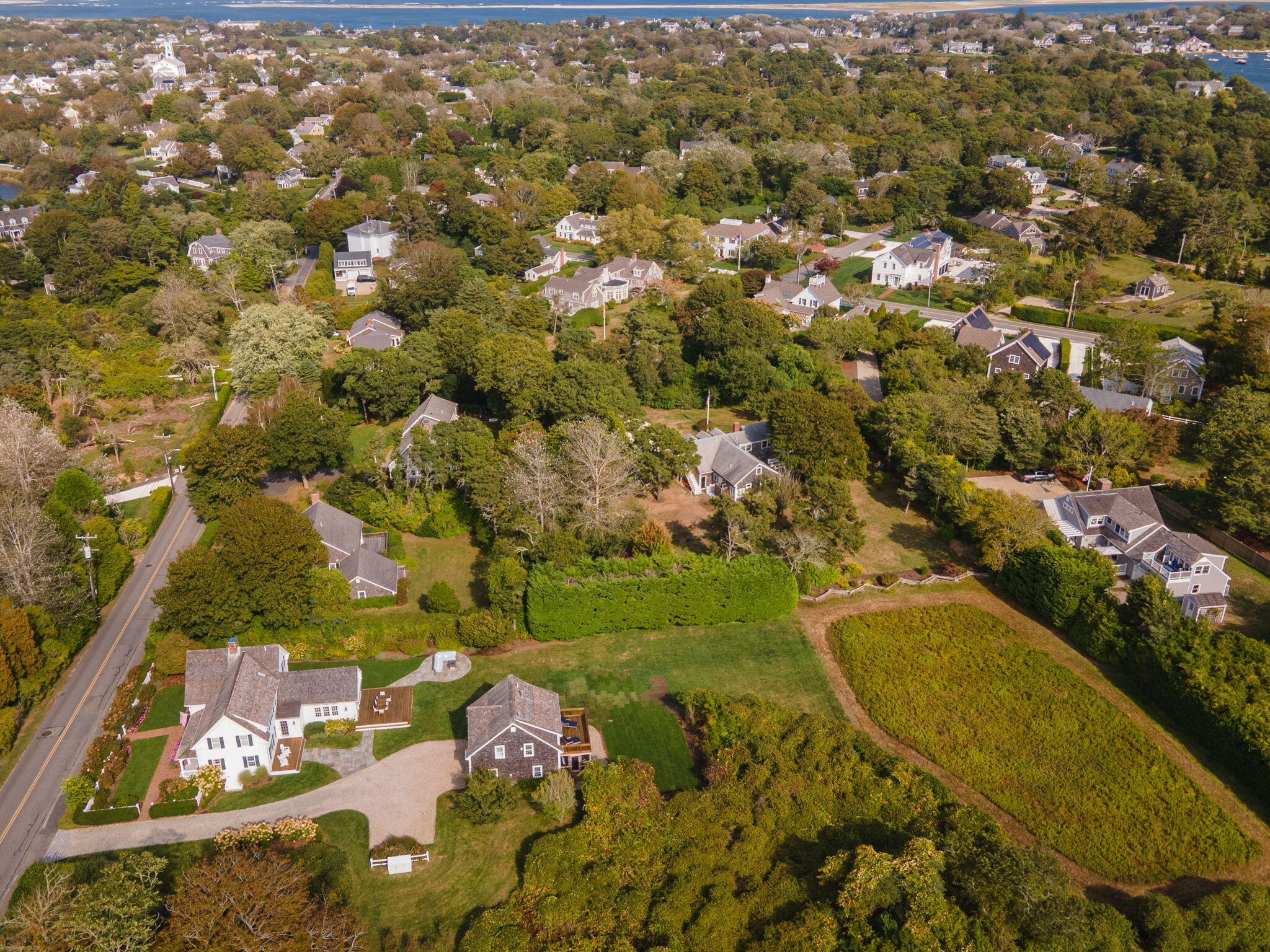 85 Cedar Street Chatham, MA 02633 - Photo 78 of 89 an aerial view of residential houses with outdoor space