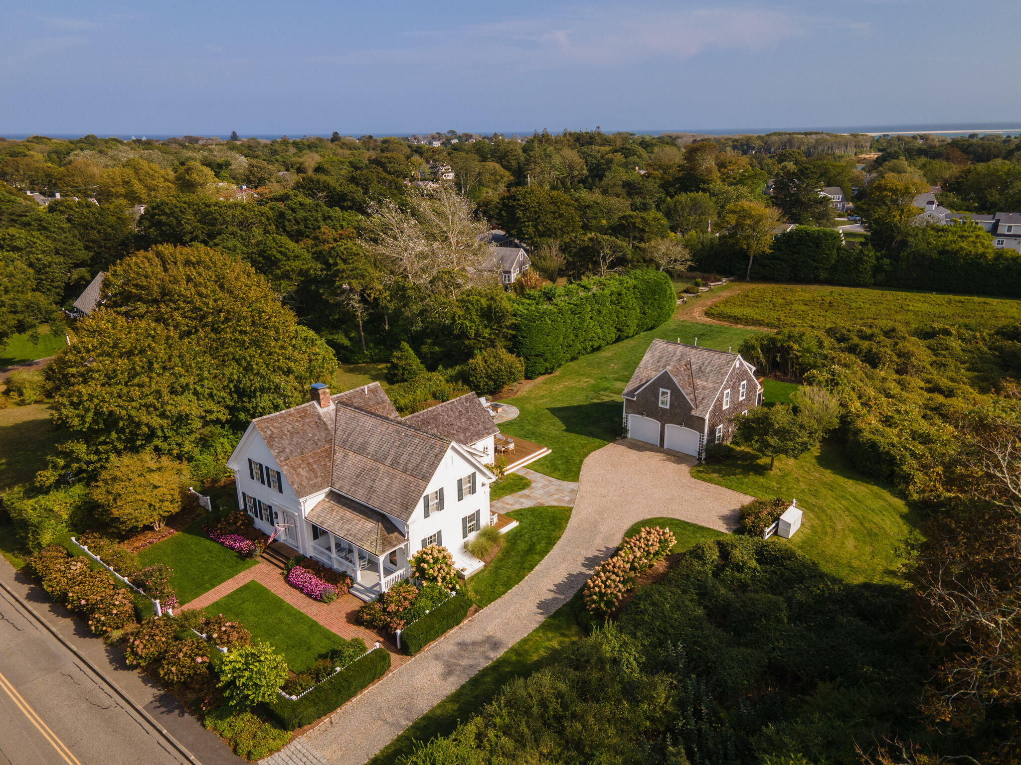 85 Cedar Street Chatham, MA 02633 - Photo 80 of 89 an aerial view of a house with a garden