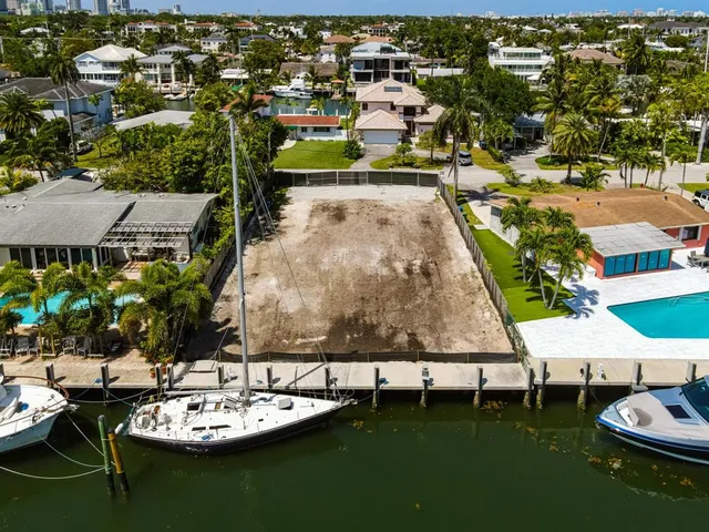 swimming pool view with a seating space