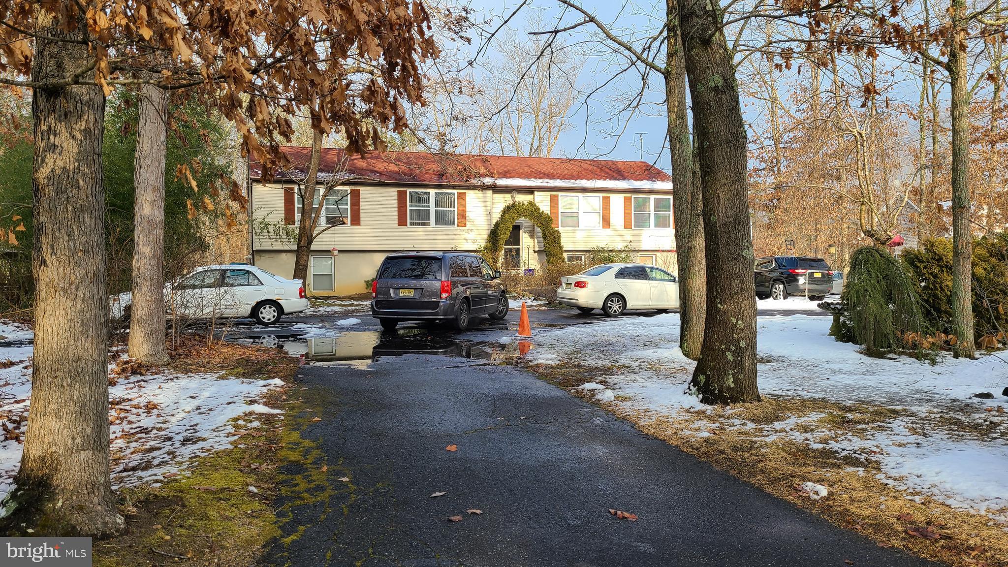 525 Jackson Road Williamstown, NJ 08094 - Photo 2 of 14 a view of a cars parked in front of a house