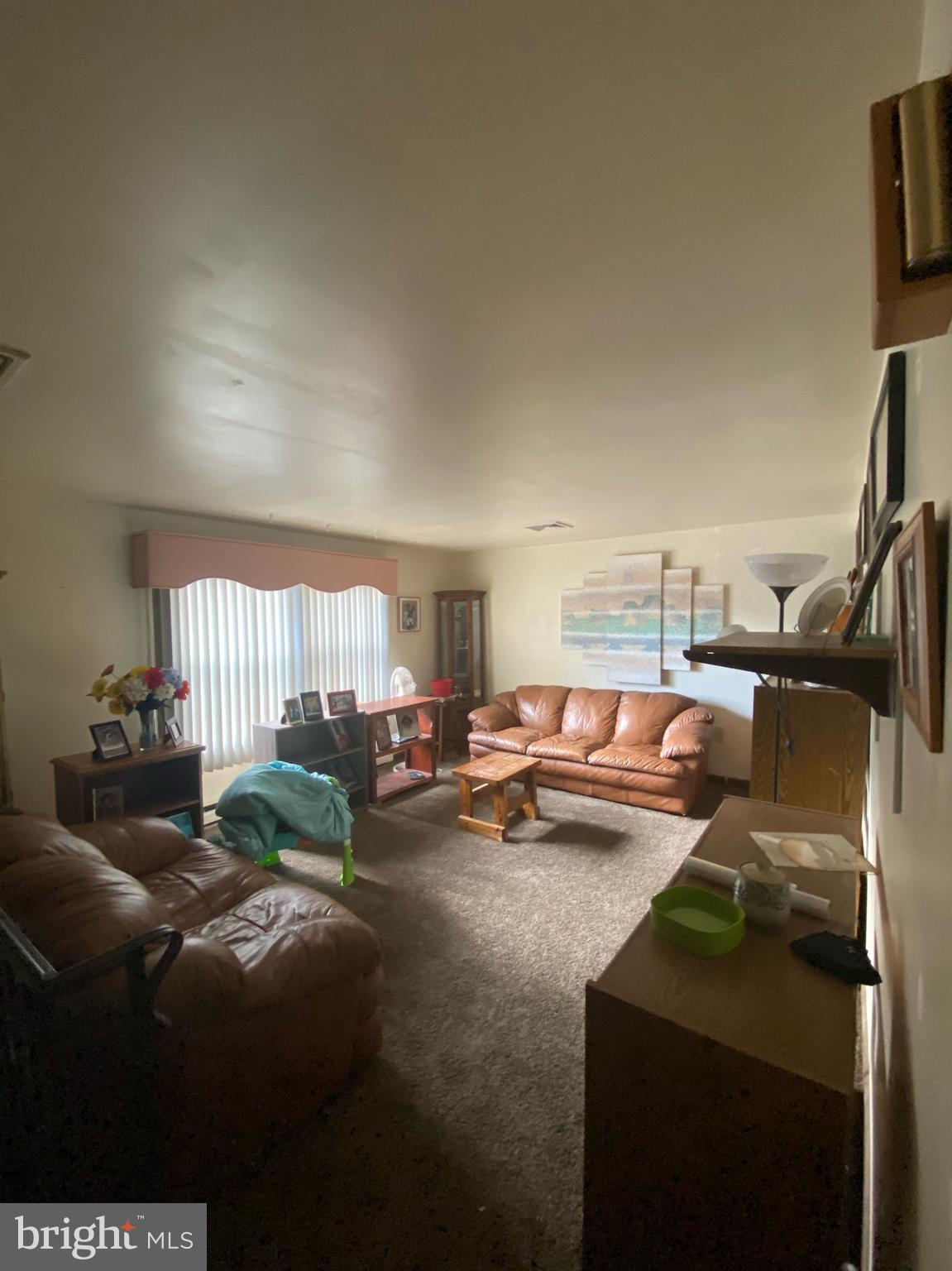 525 Jackson Road Williamstown, NJ 08094 - Photo 6 of 14 a living room with furniture and a flat screen tv
