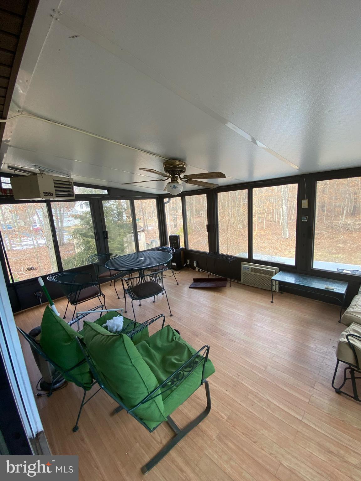 525 Jackson Road Williamstown, NJ 08094 - Photo 8 of 14 a room with lots of wooden furniture and a large window