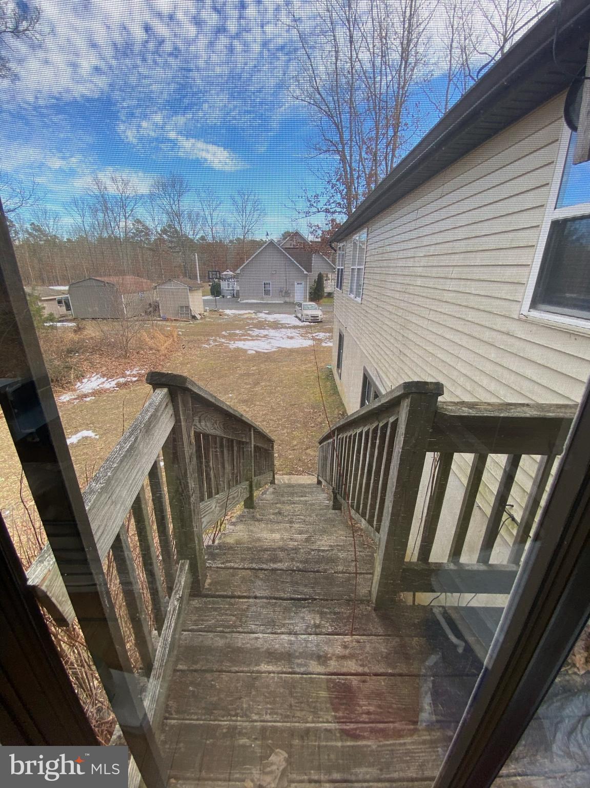 525 Jackson Road Williamstown, NJ 08094 - Photo 10 of 14 a view of balcony with wooden floor and fence