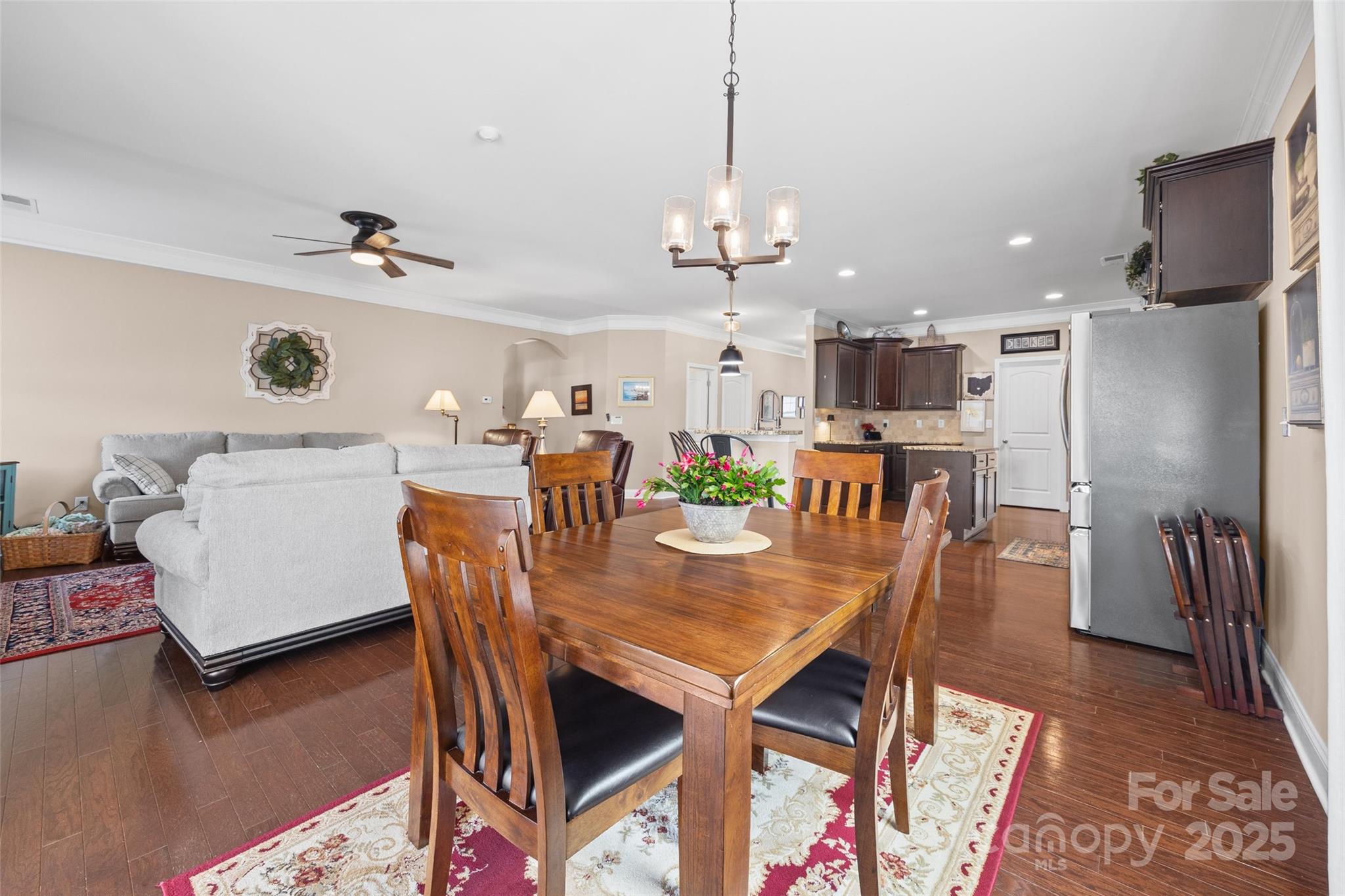 1141 Black Walnut Road Clover, SC 29710 - Photo 11 of 38 a view of a dining room with furniture and wooden floor