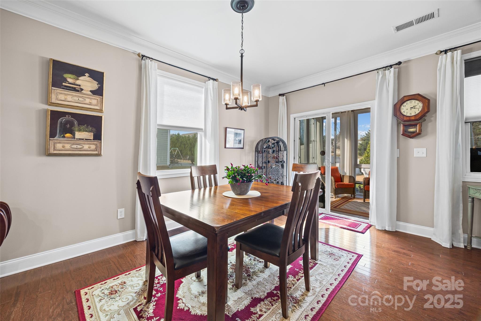 1141 Black Walnut Road Clover, SC 29710 - Photo 13 of 38 a view of a dining room with furniture window and wooden floor