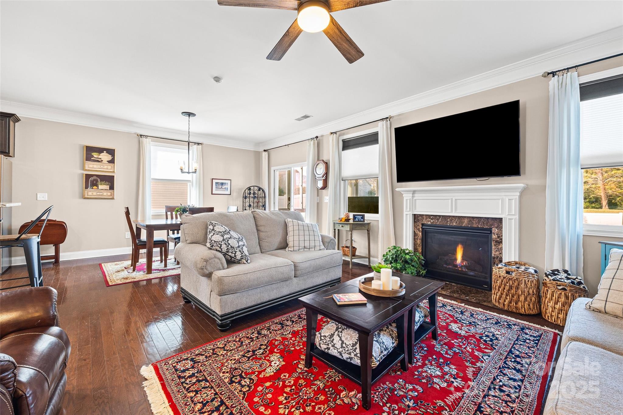 1141 Black Walnut Road Clover, SC 29710 - Photo 16 of 38 a living room with furniture a rug and a fireplace