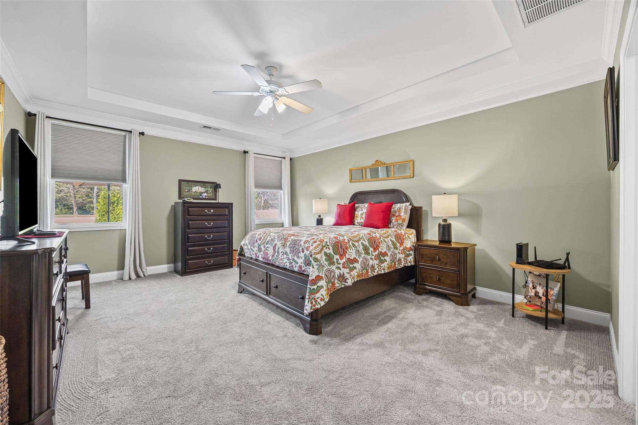 1141 Black Walnut Road Clover, SC 29710 - Photo 18 of 38 a bedroom with a bed and a chandelier