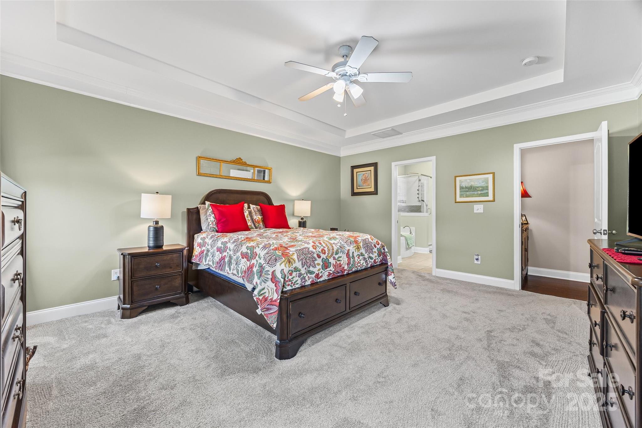 1141 Black Walnut Road Clover, SC 29710 - Photo 19 of 38 a bedroom with a bed and a chandelier