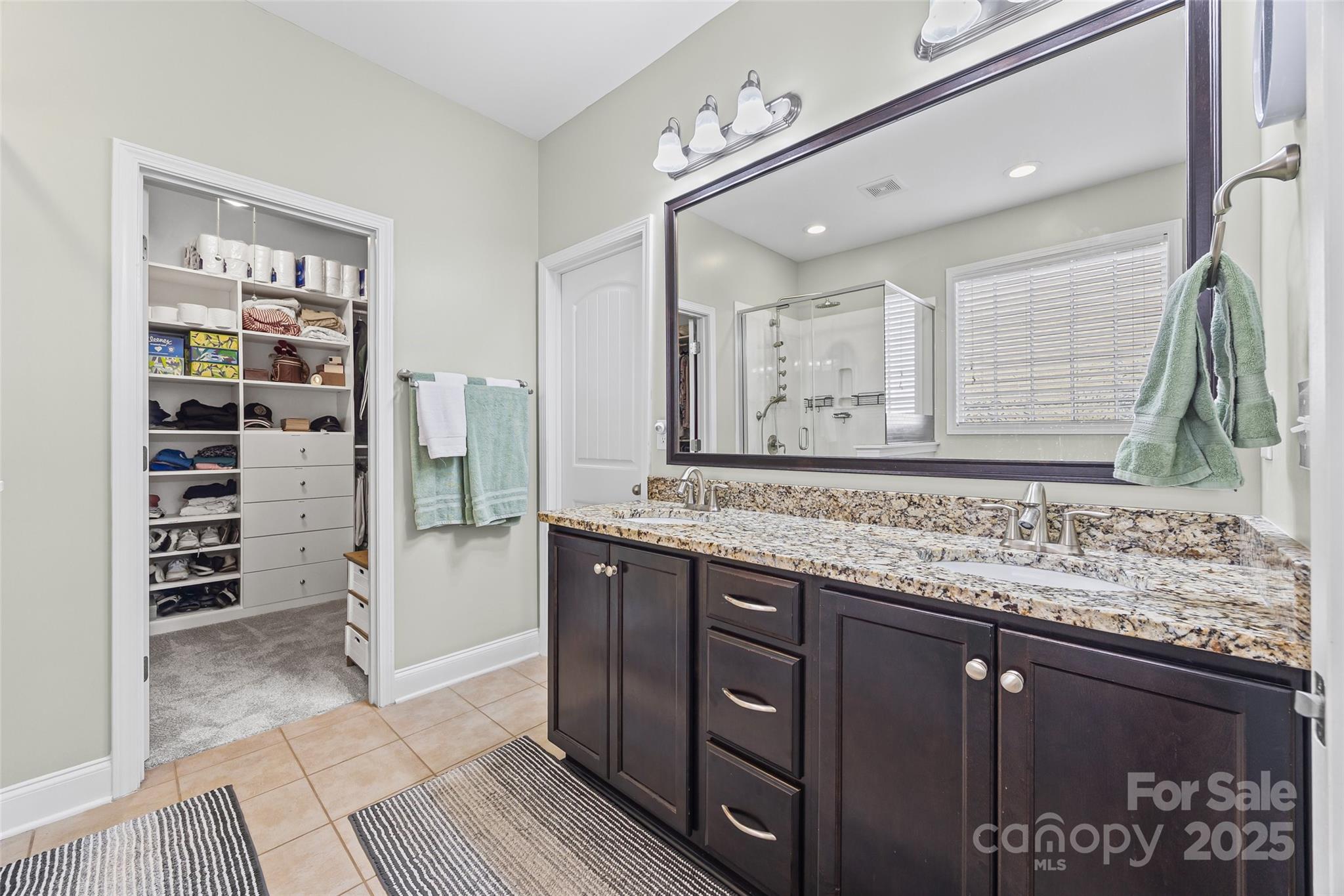 1141 Black Walnut Road Clover, SC 29710 - Photo 20 of 38 a bathroom with a granite countertop sink a toilet and a mirror