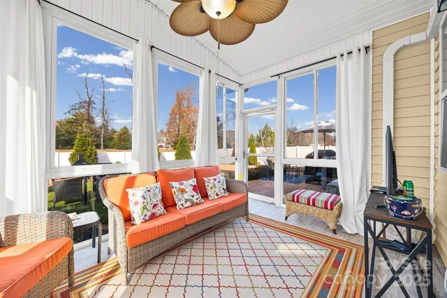 a outdoor living space with furniture and a potted plant