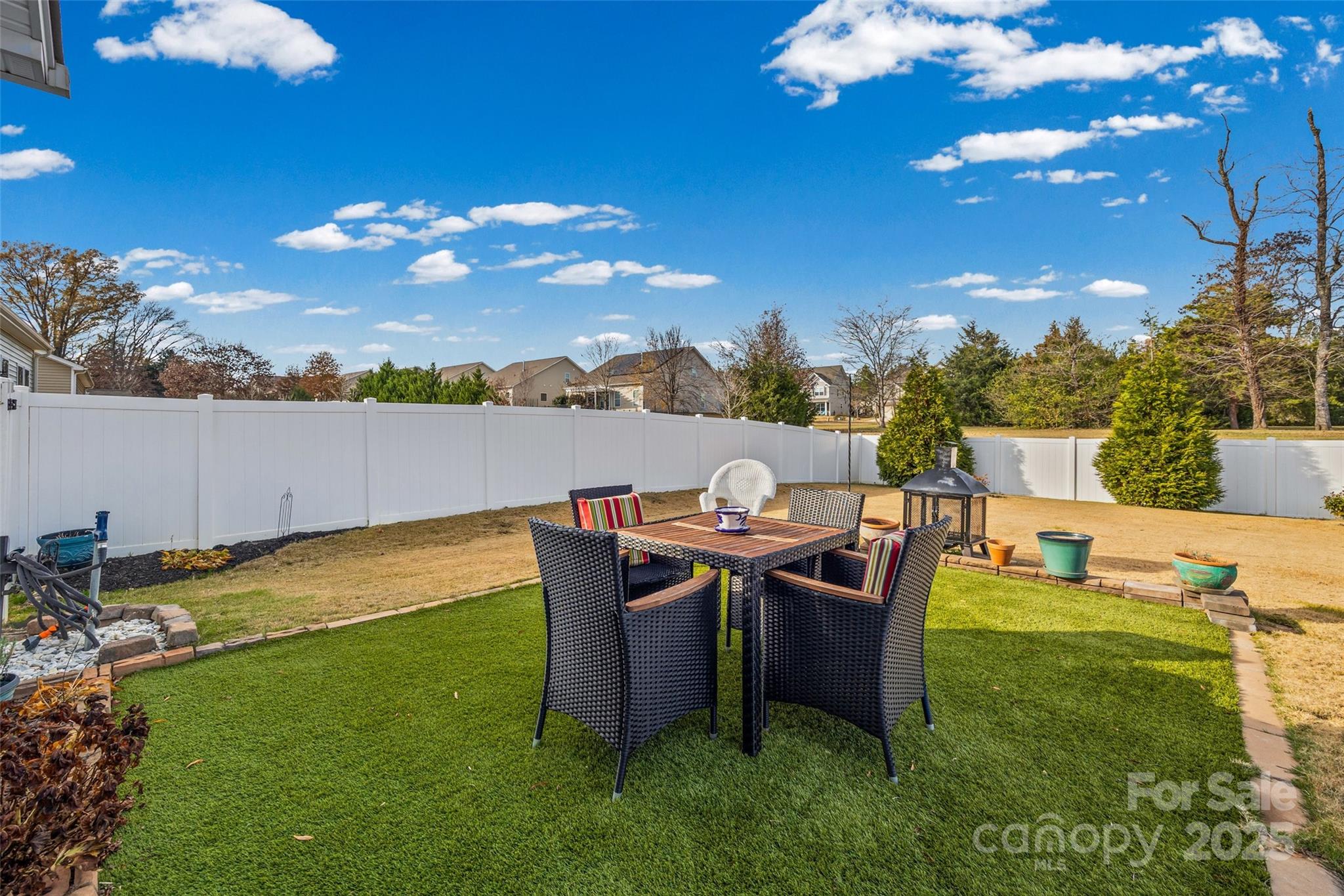 1141 Black Walnut Road Clover, SC 29710 - Photo 32 of 38 a view of a patio with table and chairs