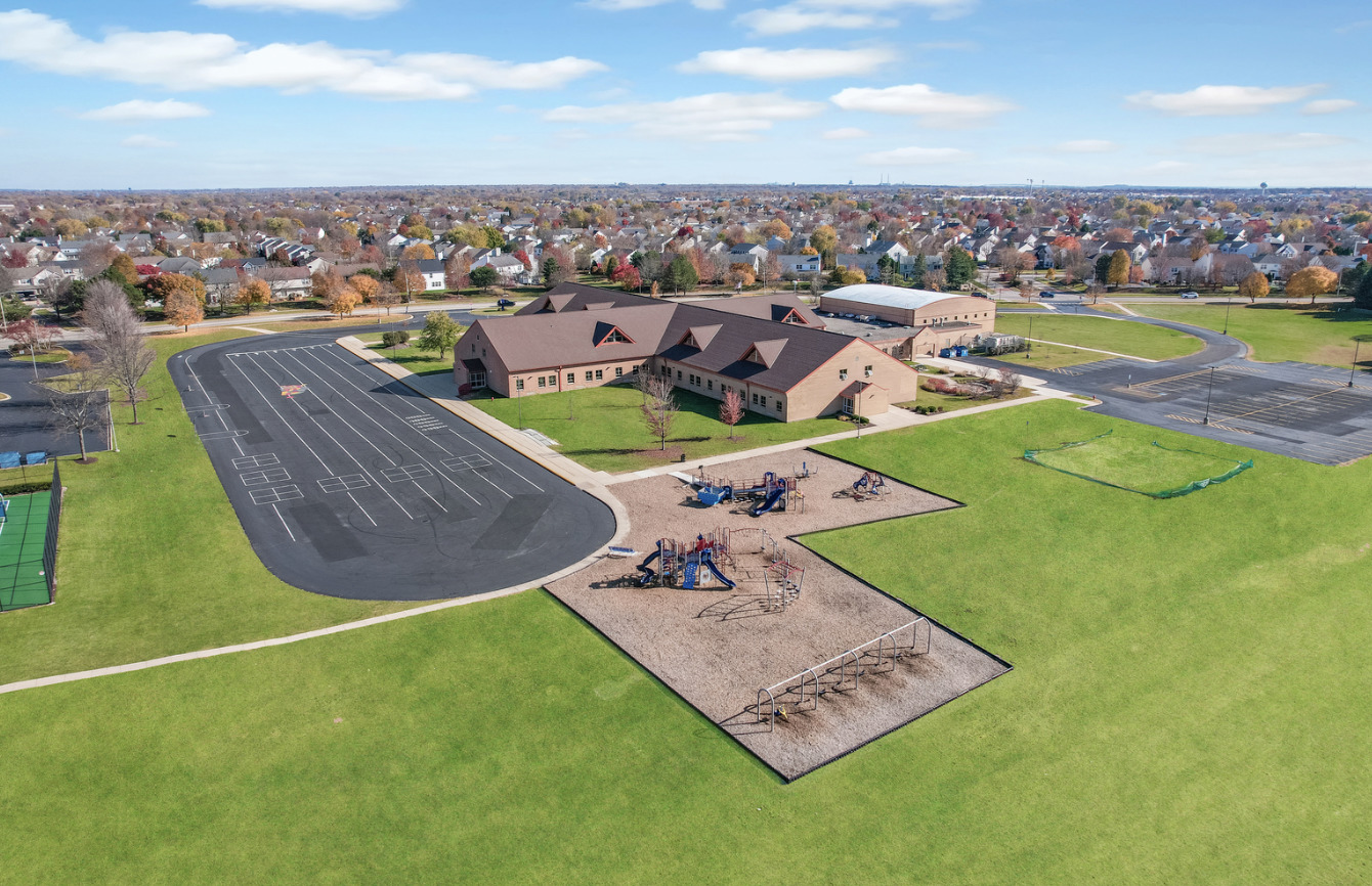5802 Emerald Pointe Drive Plainfield, IL 60586 - Photo 26 of 28 an aerial view of a house having yard